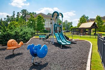 Children have a place to run and play at alden place too! Slides, climbing equipment and bike parking